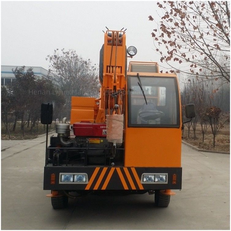 12000kg Rated Loading Capacity Chassis Crane With Hengli Hydraulic Valve And 1989-3329mm Span